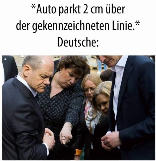 *Auto parkt 2 cm über der gekennzeichneten Linie.* - Deutsche: